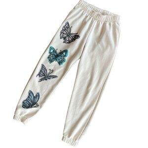 Wild Fable butterfly print fleece joggers in a cream color
